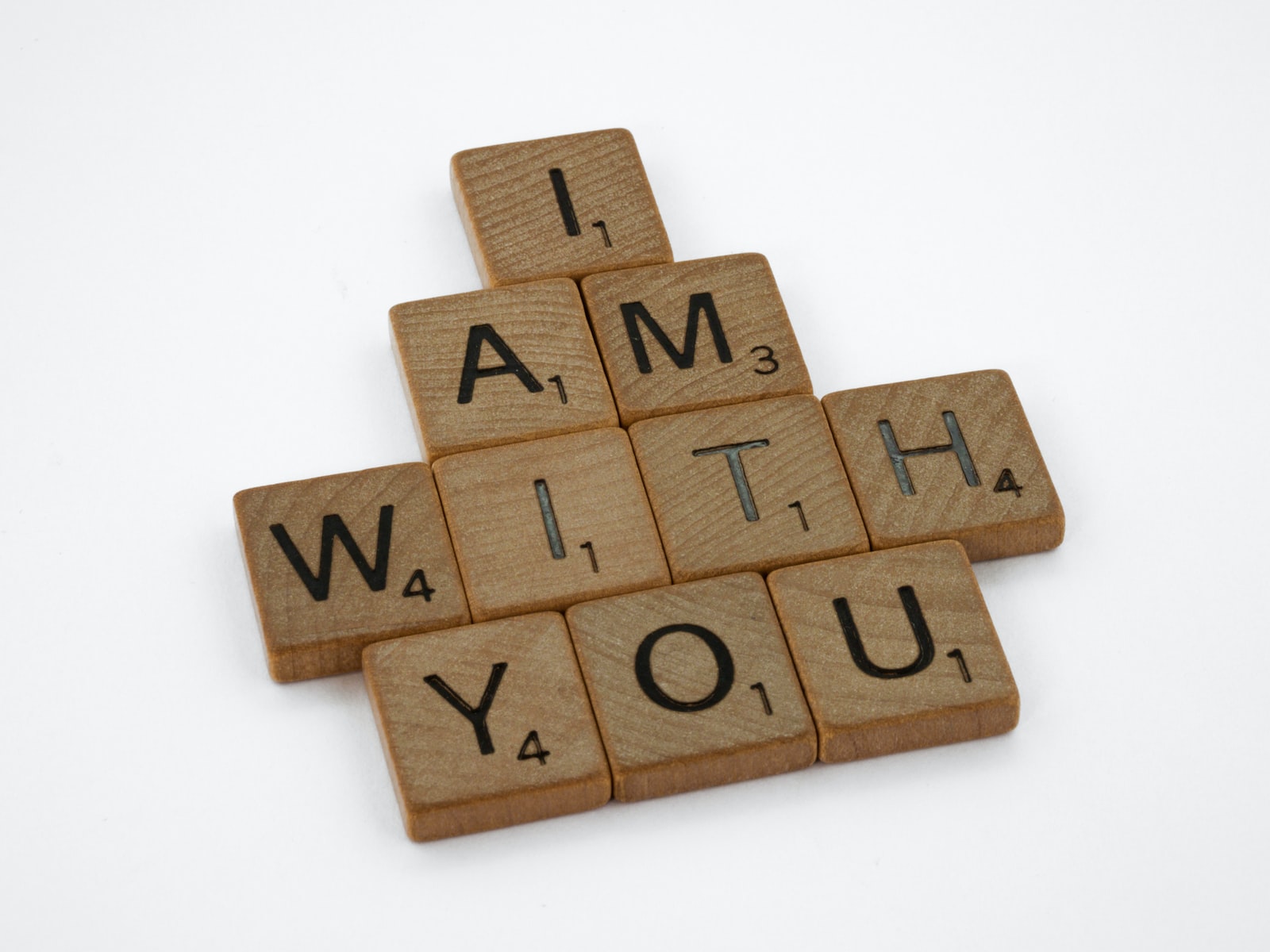 Photo by Brett Jordan brown wooden blocks on white surface